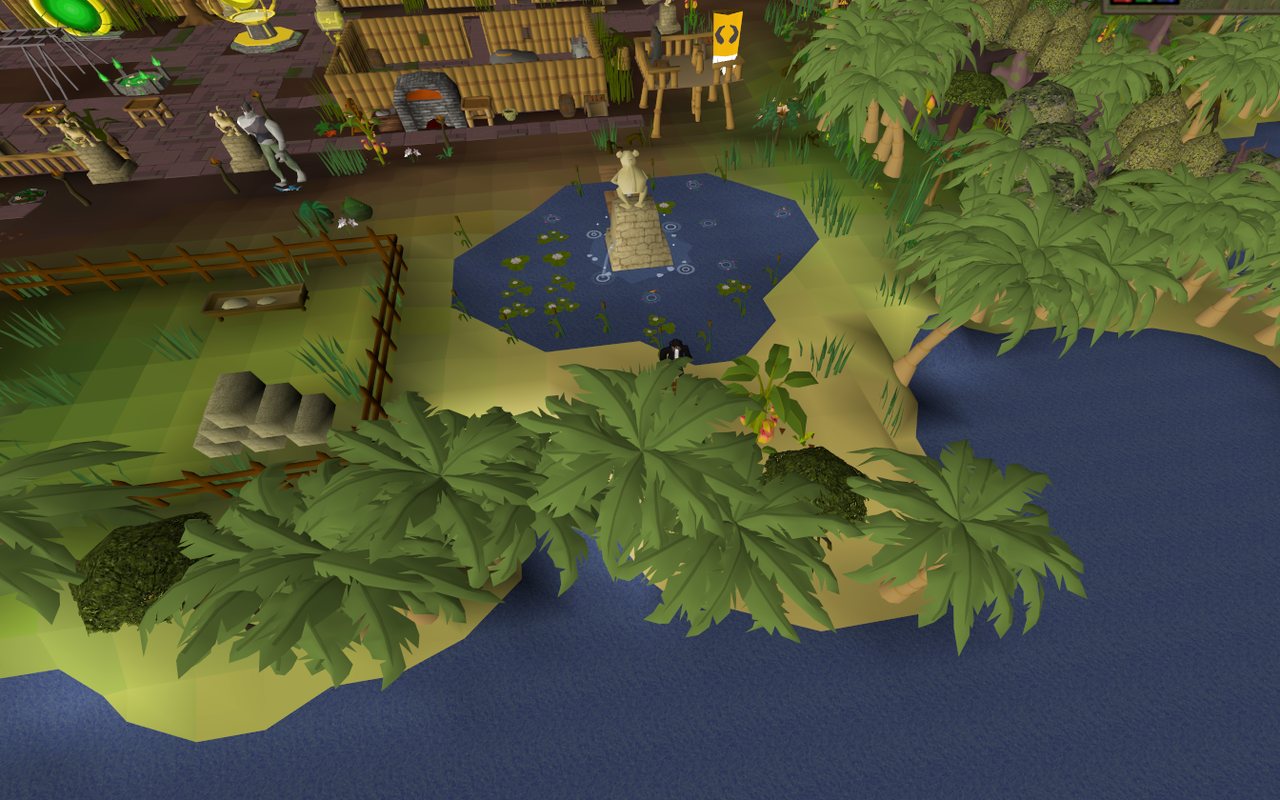 The monkey town on the Donator Zone island, with its pond, fountain and bamboo buildings